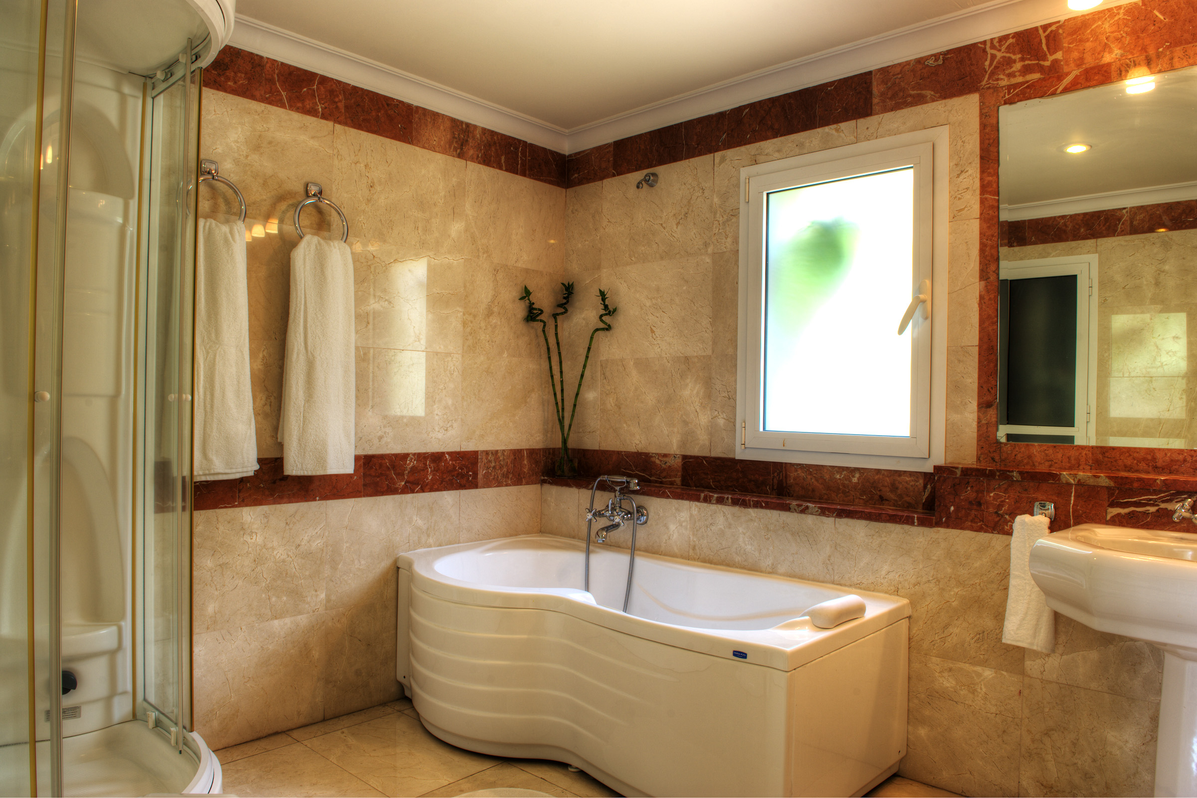 10 Elegant Brown And White Bathroom Ideas sweet bathroom with white bathtub also brown gloss marble bathrooms 2024