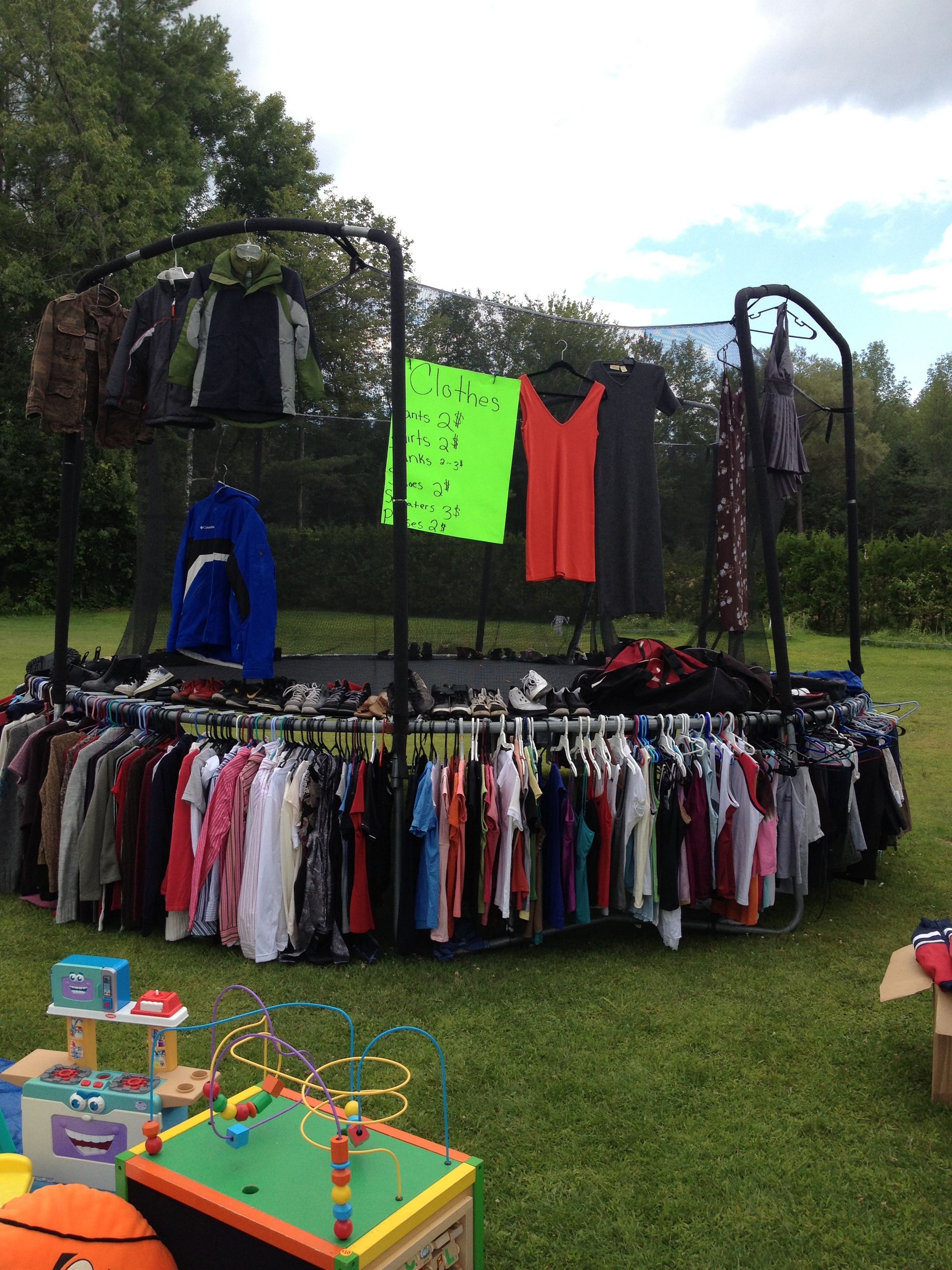 10 Gorgeous Yard Sale Set Up Ideas use your trampoline to set up clothes for big garage sales 2024