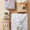 baby gift wrap ideas: showered with love | lambs, garlands and wraps