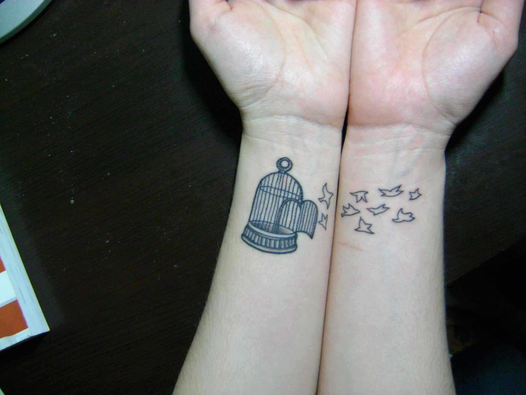 10 Stunning Wrist Tattoos For Guys Ideas bird free from cage tattoo wrist best tattoo designs pinterest 2022