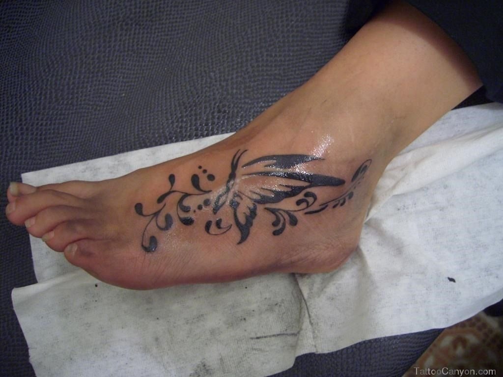 10 Perfect Tattoo Ideas For The Foot butterfly tattoos on foot tribal tattoo designs meaning picture 1 2022