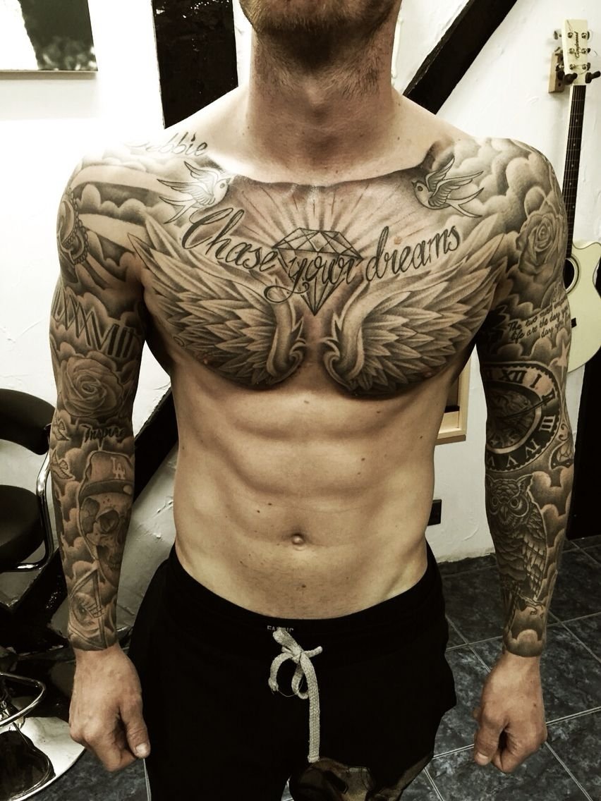 10 Fabulous Chest Piece Tattoo Ideas For Guys chest piece and sleeve tattoos pinterest tattoo ink chest 2022