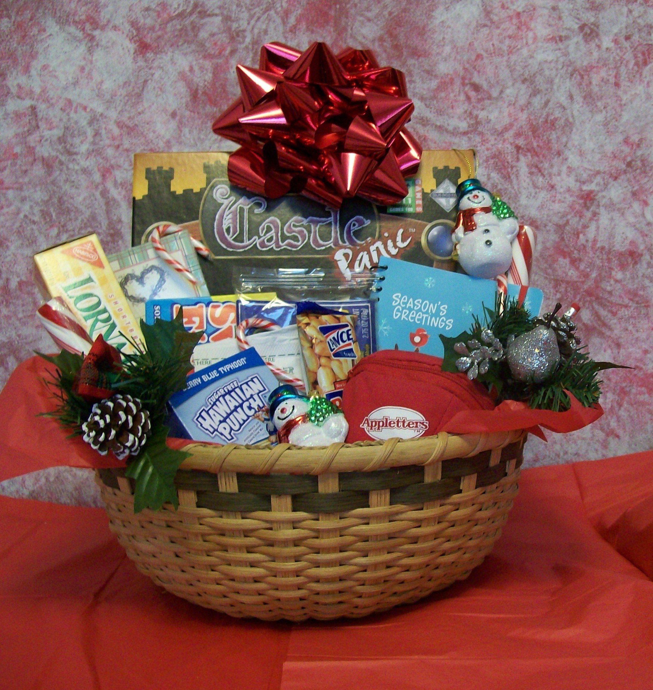 10 Great Gift Basket Ideas For Christmas create a christmas fun and games gift basket for a family all 1 2022