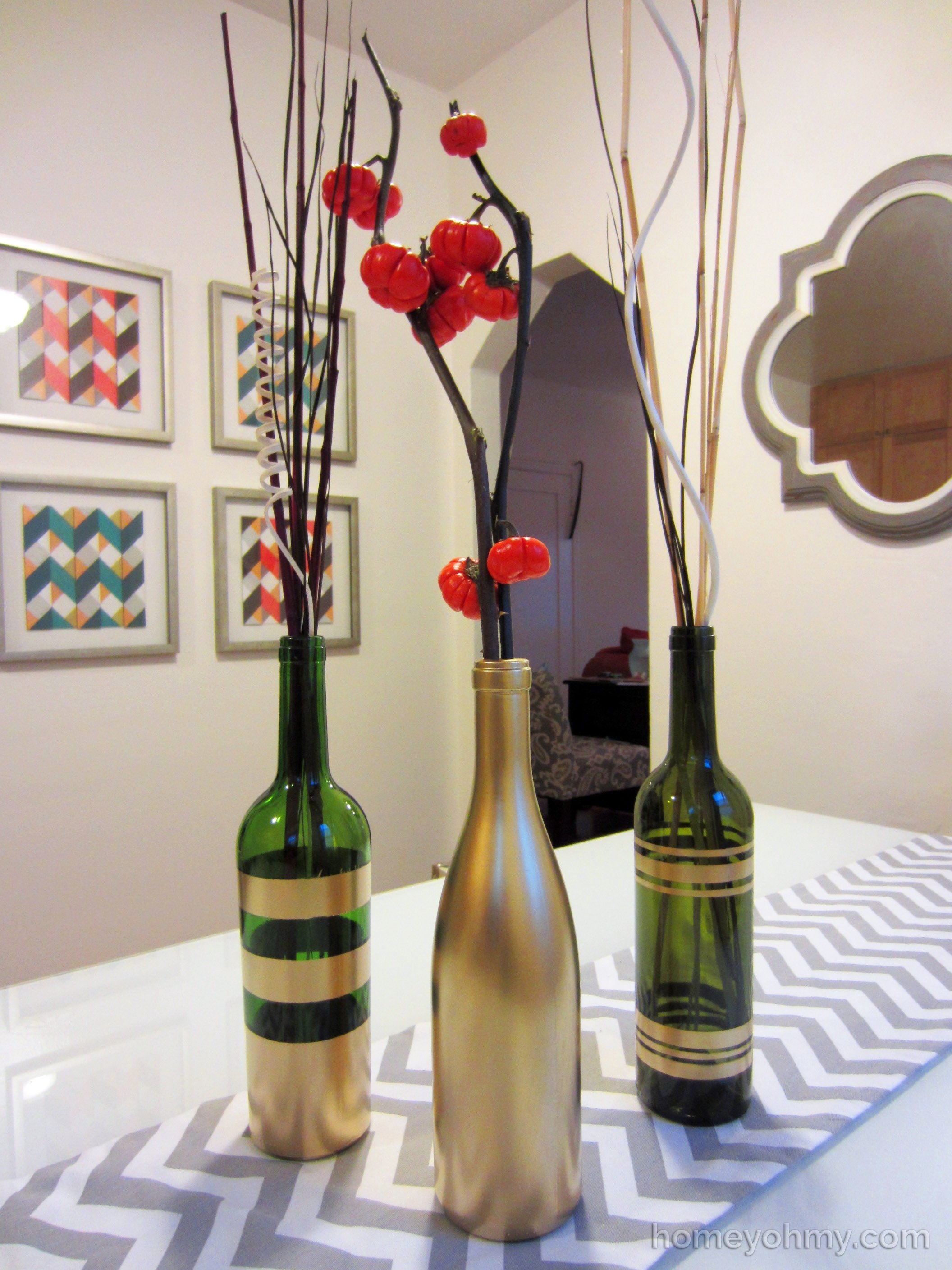 10 Stylish Ideas For Old Wine Bottles diy spray painted wine bottles for fall decorating 2022