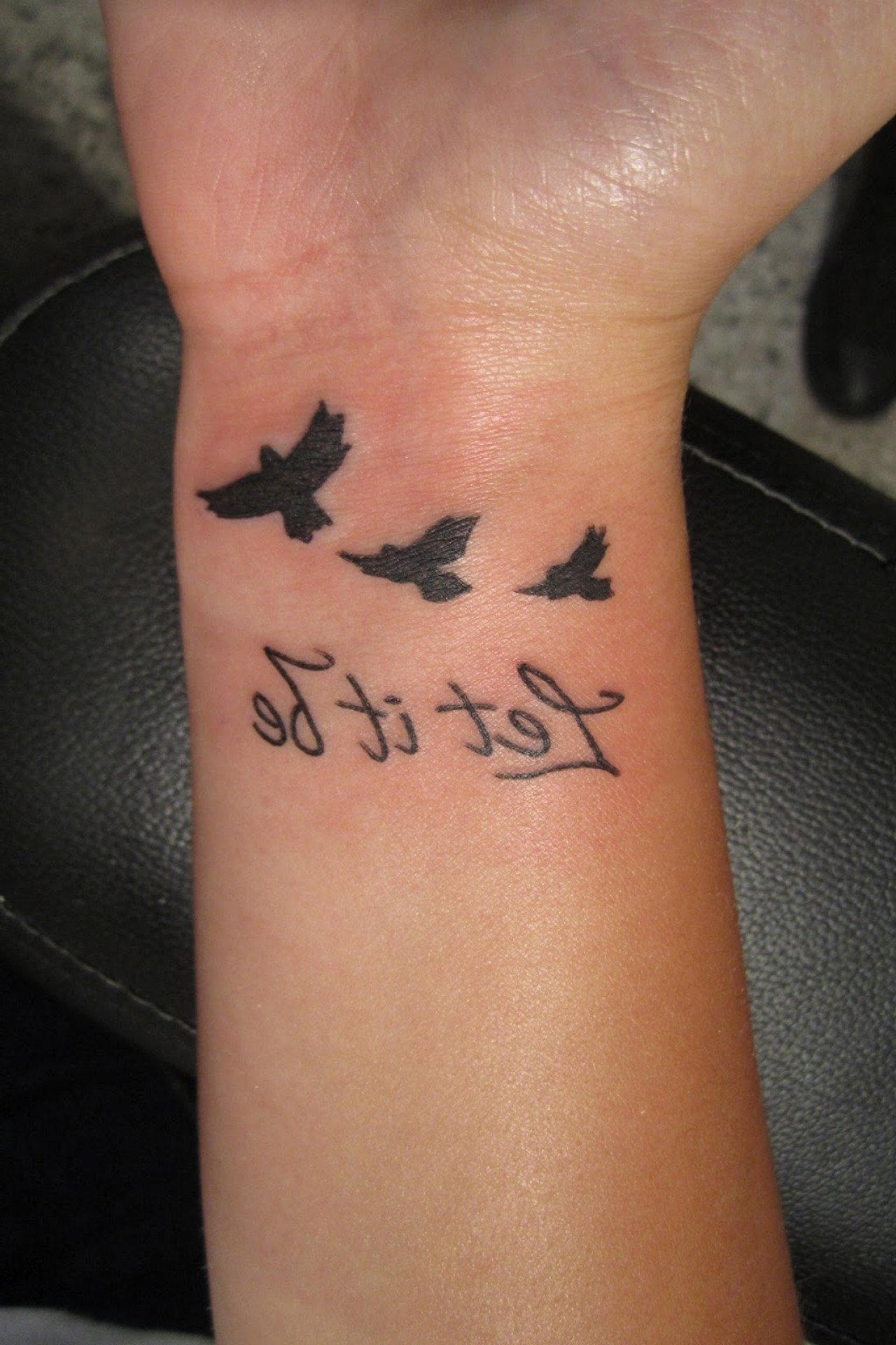 10 Trendy First Tattoo Ideas For Girls feather tattoo on wrist of girl caymancode 2022