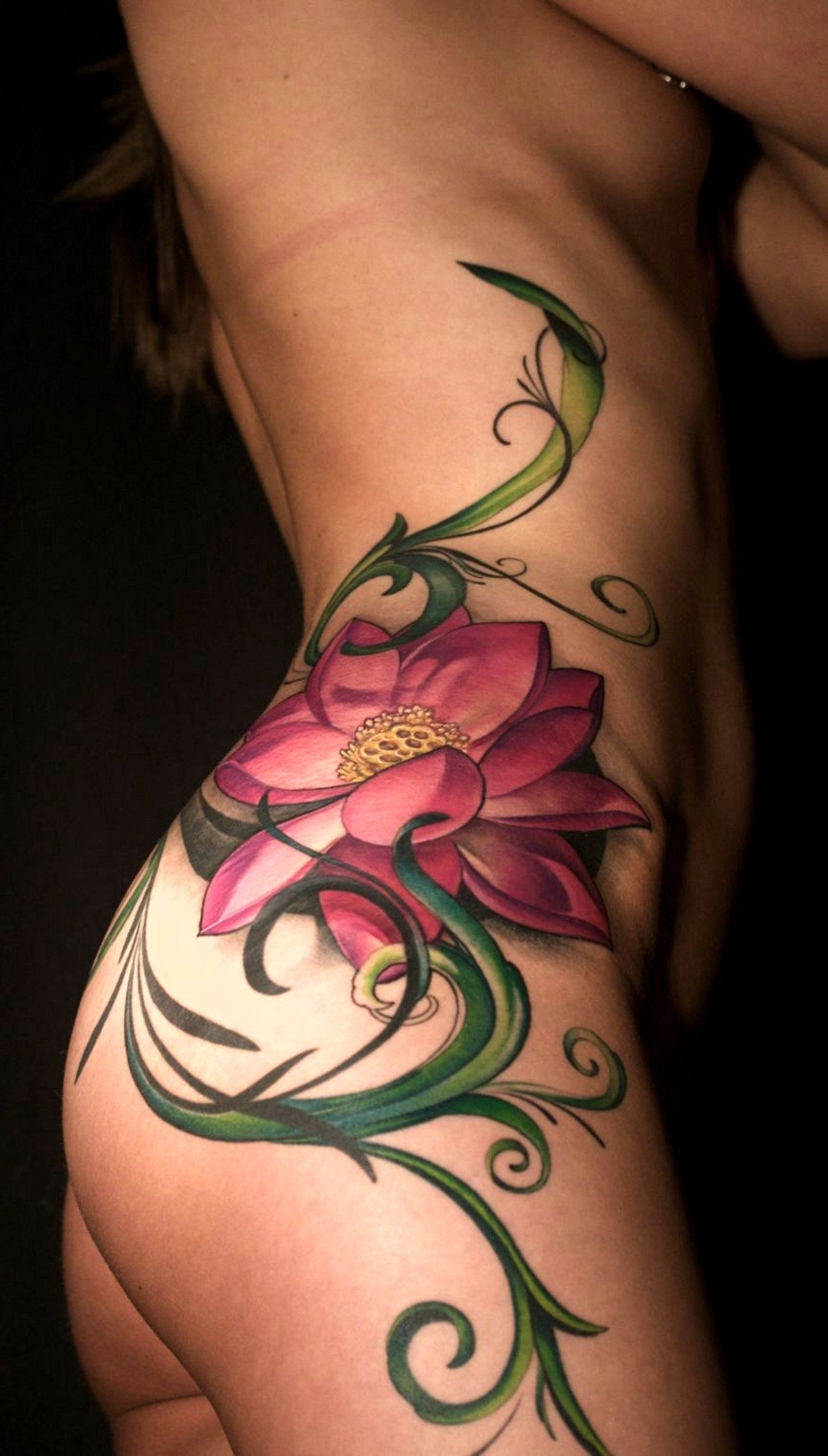 10 Elegant Tattoo Ideas For Side Of Body floral tattoos lotus flower lotus and tatting 2022