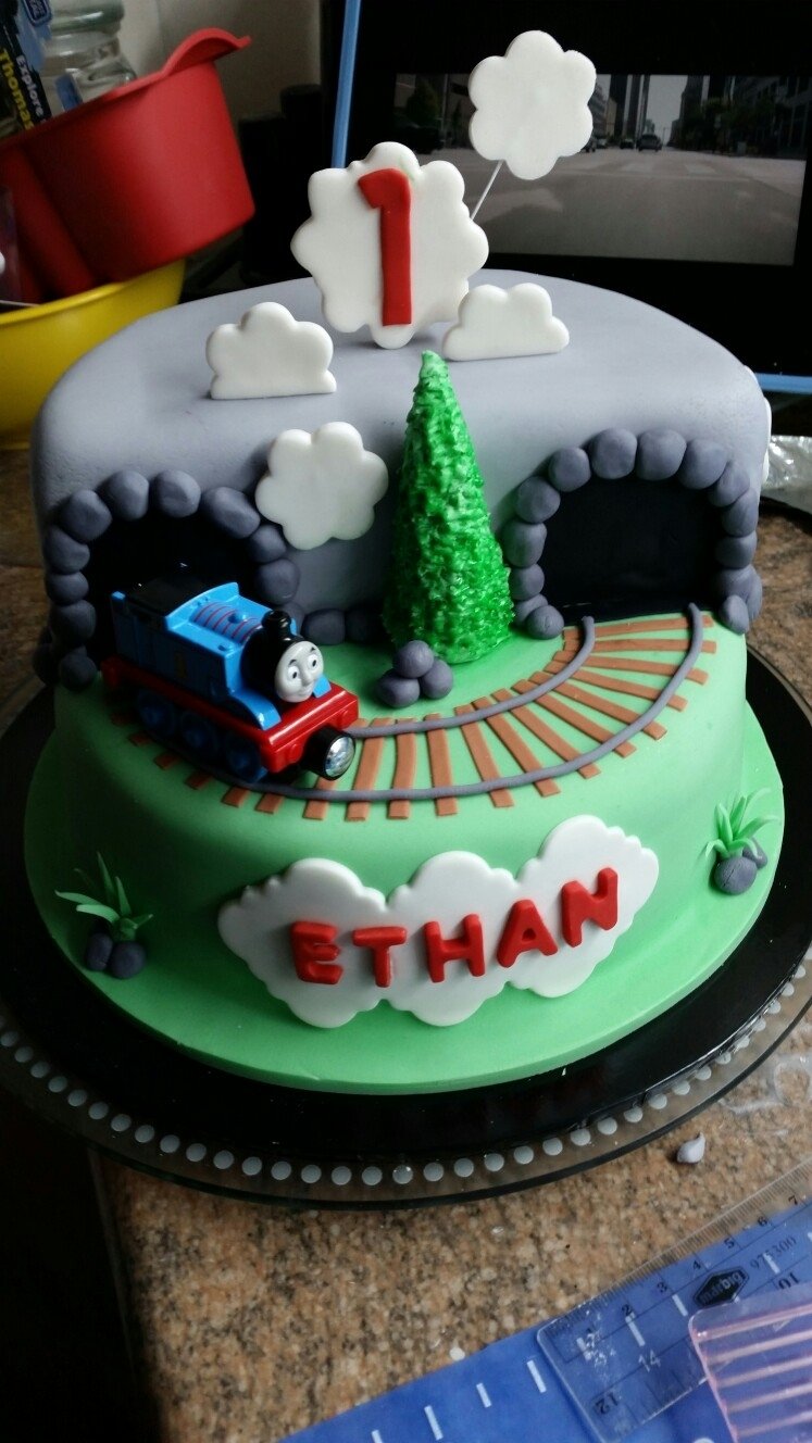 10 Attractive Thomas The Train Birthday Cake Ideas fondant thomas the train engine birthday cake with track and tunnel 2022