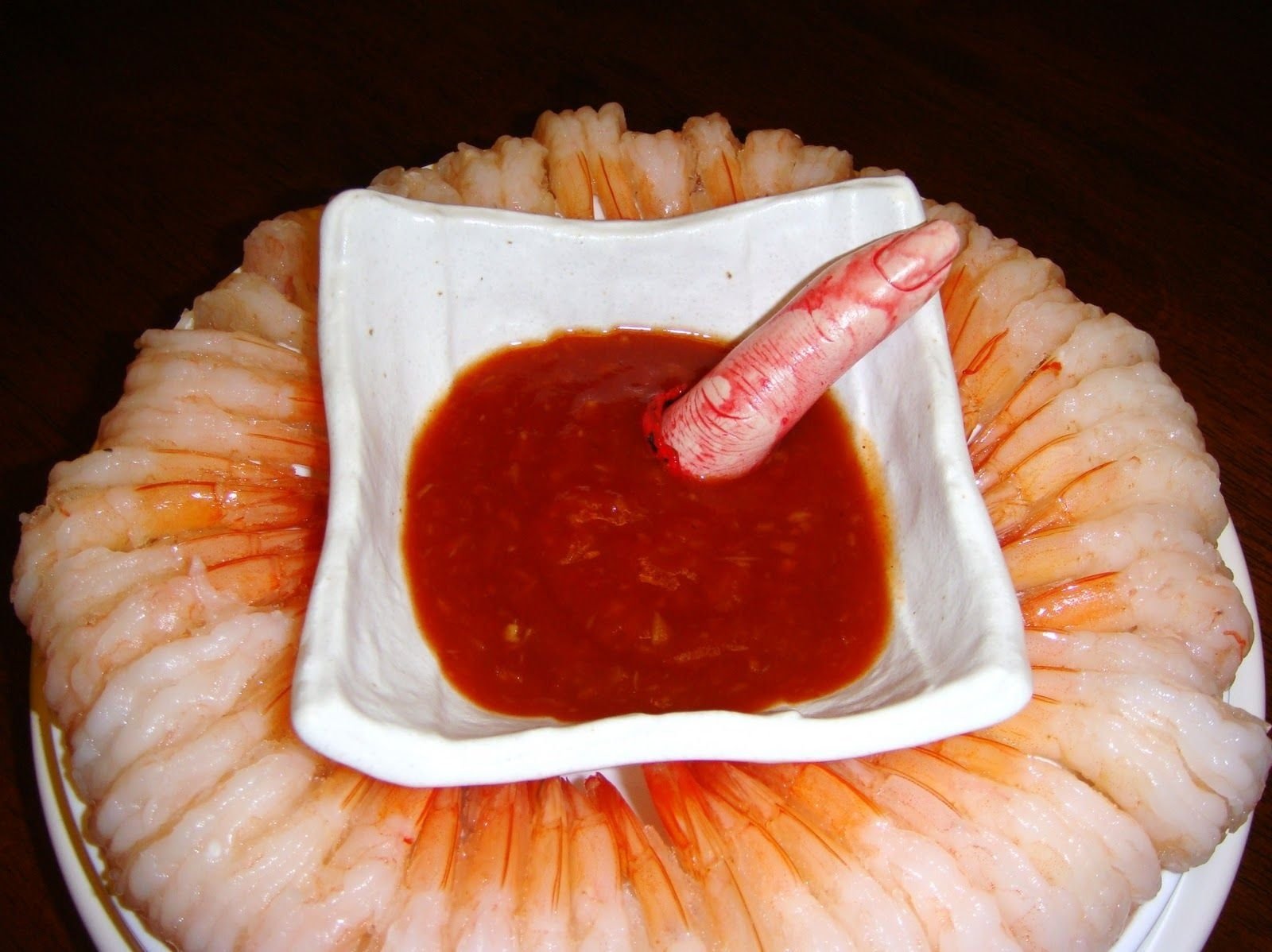 10 Unique Gross Halloween Party Food Ideas for the jaws party a shrimp ring with cocktail sauce just add 2022