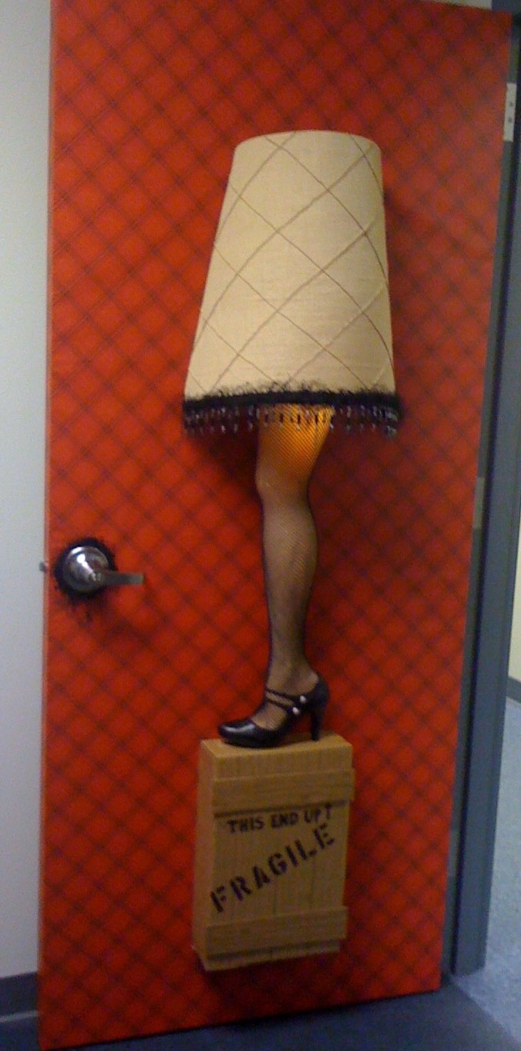 10 Gorgeous Holiday Door Decorating Contest Ideas leg lamp door decor from our office office door contest 2023
