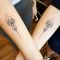 mine and my sister's matching tattoossyluss @ songbird tattoo