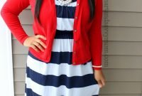 navy and whtie striped dress, red cardigan and pearl jewelry. modest