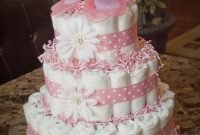 pink baby girl shower diaper cake topped with butterfly | things i