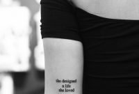 she designed a life she loved” tattoo on the back of the left arm