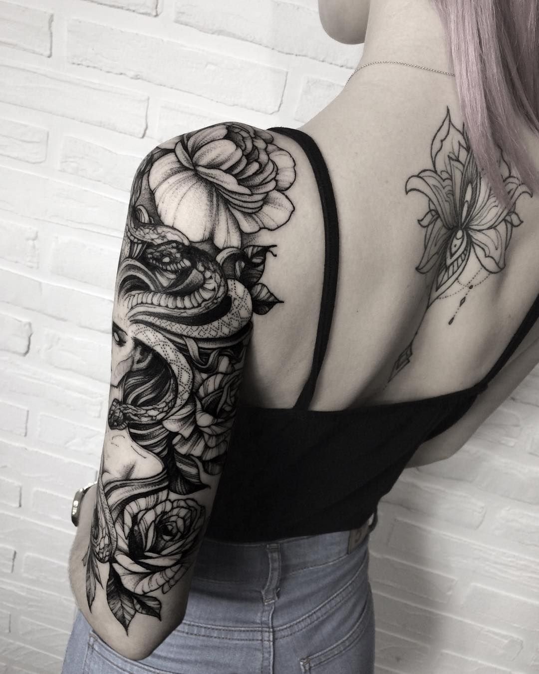 10 Beautiful Sleeve Tattoos For Women Ideas snake woman sleeve tattoo idea snake tattoos pinterest woman 2 2022