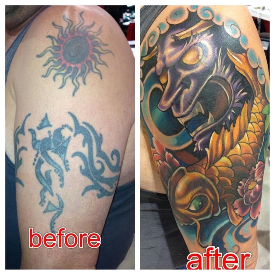 10 Lovely Ideas For Cover Up Tattoos tribal tattoo cover up with japanese mask and koi tattoos 4 2022