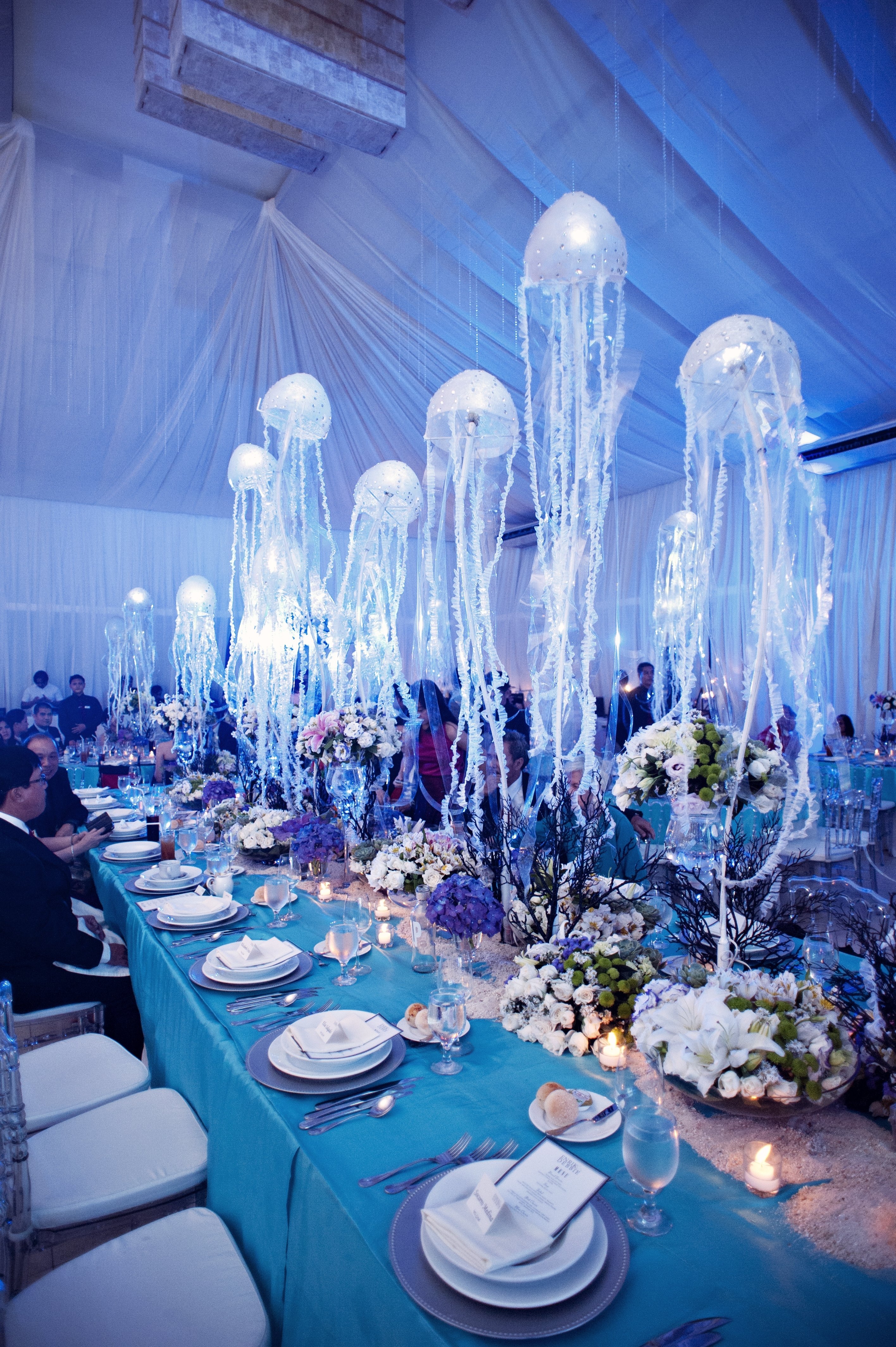10 Fabulous Under The Sea Centerpiece Ideas under the sea wedding motif with hanging jellyfish table decorations 2022