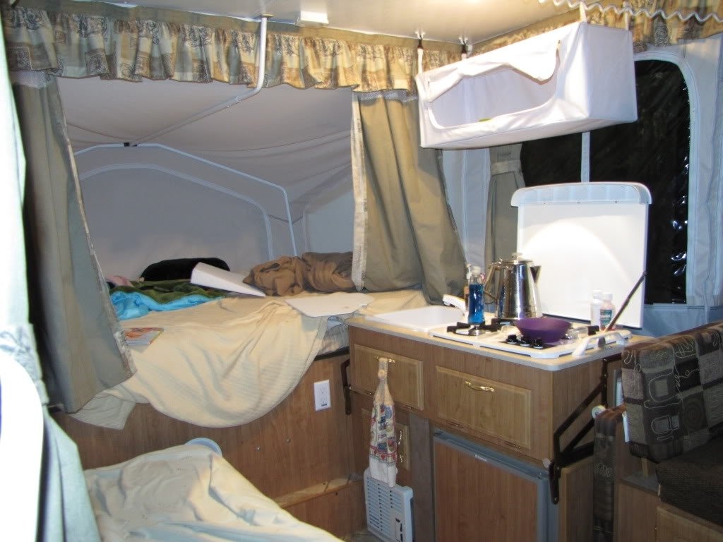 10 Lovable Pop Up Camper Storage Ideas vinyl overhead hanging cabinet camper pop up camper organization 2022