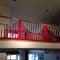yarn bombing your banister for a san francisco themed party. | arts